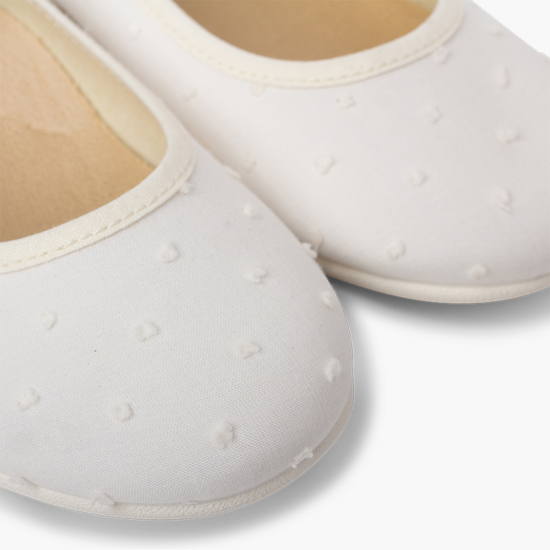 Ballerinas für Mädchen mit Riemchen und Pünktchenmuster Beige