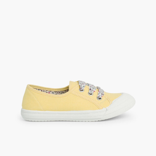 Stoff Turnschuhe mit Gummispitze und Schnürsenkeln Gelb