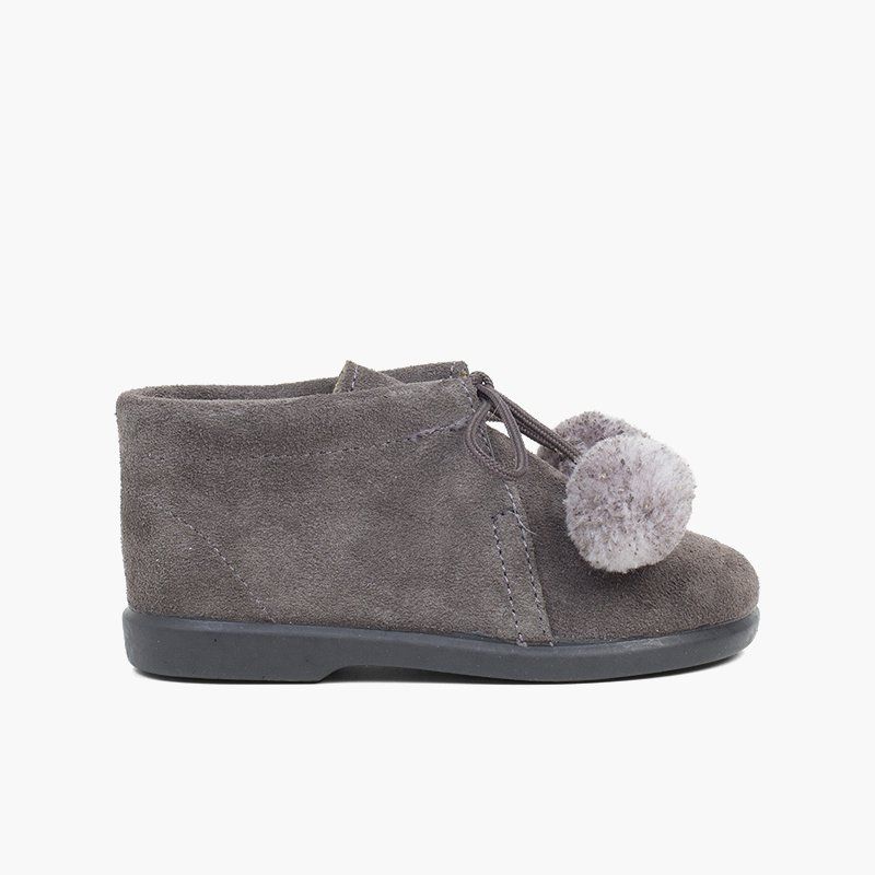 Stiefeletten mit Pompons für Mädchen und Jungen