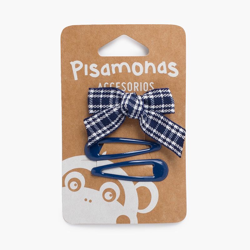 Packung mit Gabeln und Tartanbogen